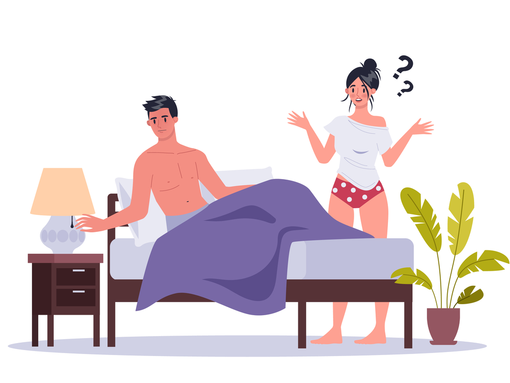 Man wearing underwear in bed reaching for his bedside lamp with woman standing behind the bed shrugging in question.